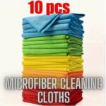 Pack of 10 colourful multi purpose microfibre cleaning cloths stacked neatly on a kitchen worktop