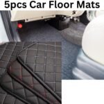 Black PU leather universal car floor mats 5-piece set laid out for front and rear seat vehicle carpet protection